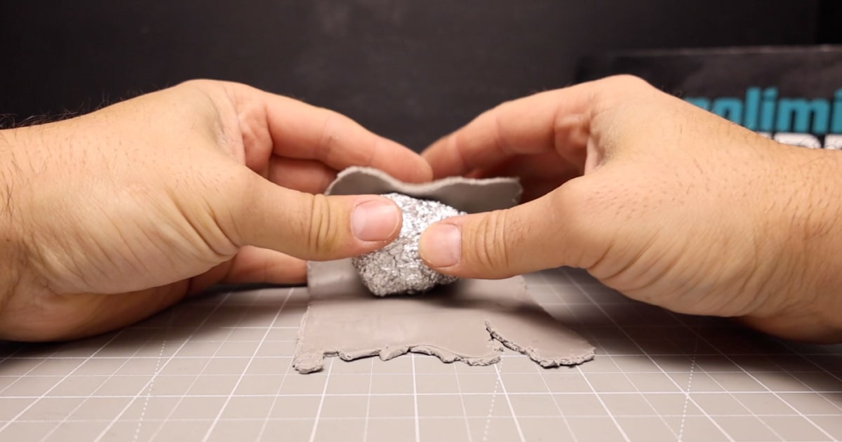 Start Creating The Beetlejuice Bob Head Using Ball of Clay Wrapped In Foil