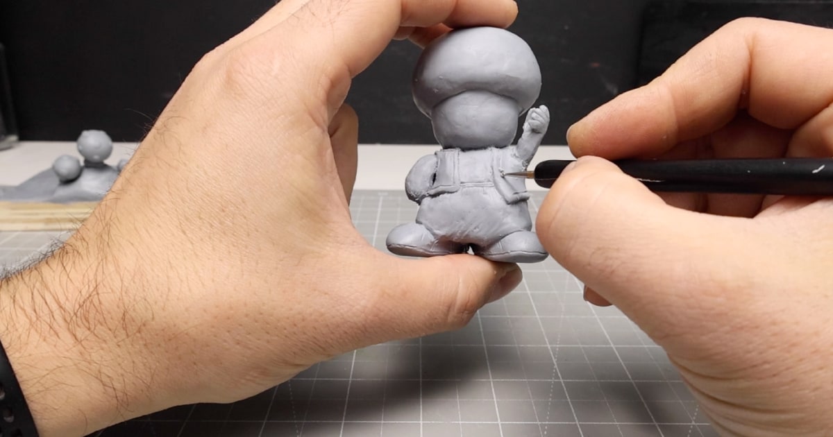 Adding The Finer Details To Toad Sculpture