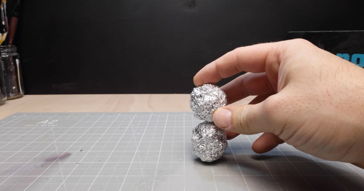 Creating Two Tin Foil Balls for Santa Figure Body & Head